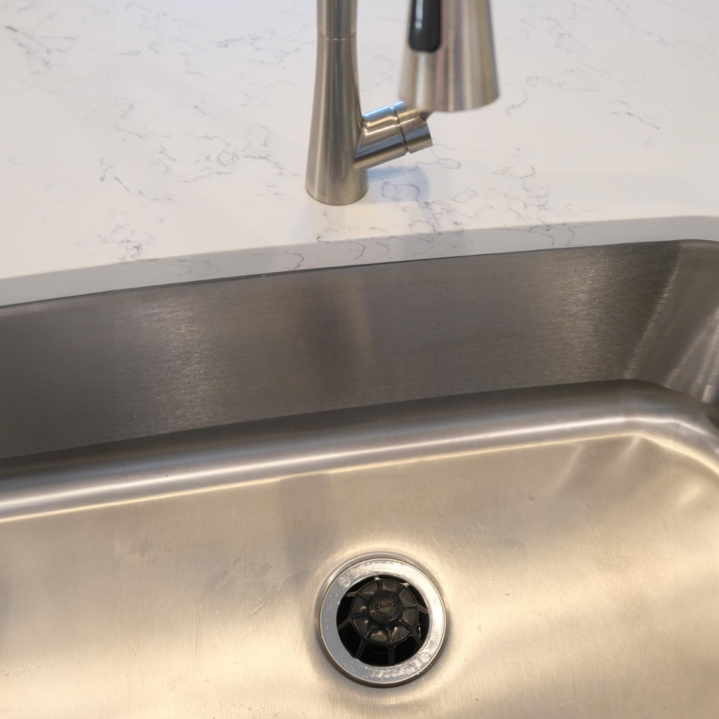 DANCO Disposal Genie Garbage Disposal Strainer | Kitchen Sink Drain Splash Guard | Food Scraper | Black (10051)