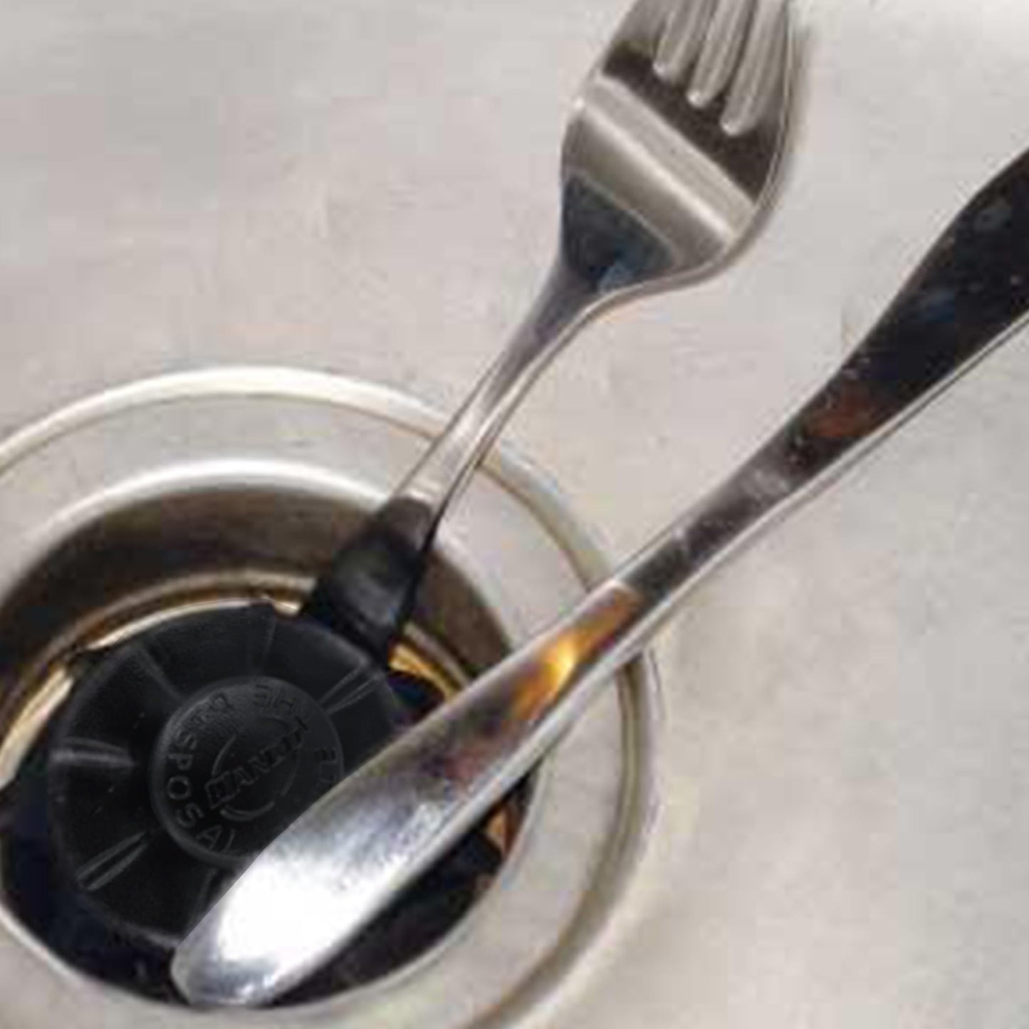 DANCO Disposal Genie Garbage Disposal Strainer | Kitchen Sink Drain Splash Guard | Food Scraper | Black (10051)