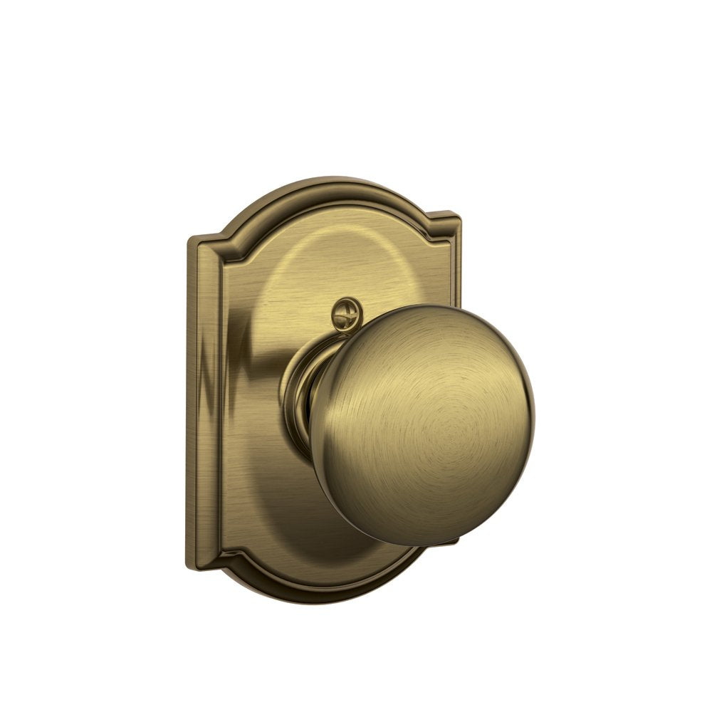 Schlage Plymouth Knob with Camelot Trim Non-Turning Lock, Antique Brass (F170 PLY 609 CAM)