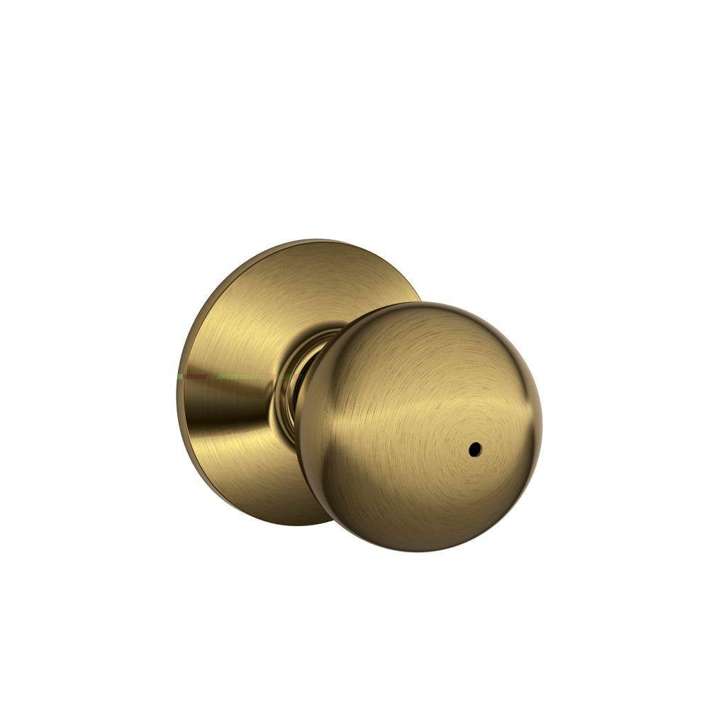 SCHLAGE F40ORB609 Orbit Privacy Knob, Antique Brass