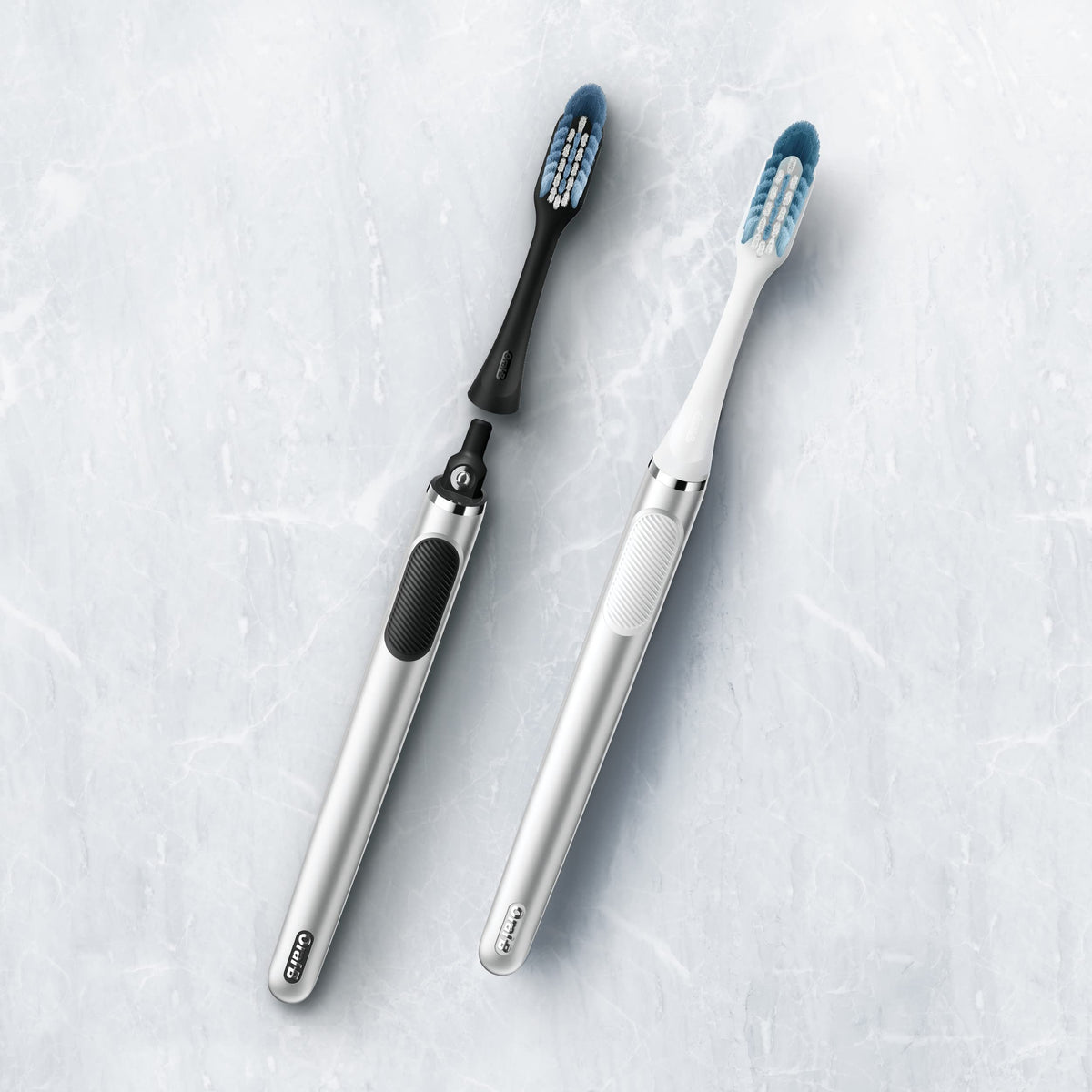 Oral-B Clic Toothbrush, Chrome White, with 1 Replaceable Brush Head and Magnetic Holder