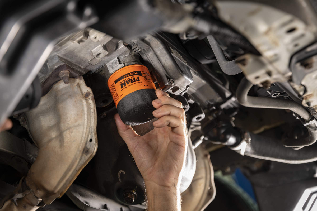 FRAM Extra Guard PH12060, 10K Mile Change Automotive Replacement Interval Spin-On Engine Oil Filter for Select Vehicle Models